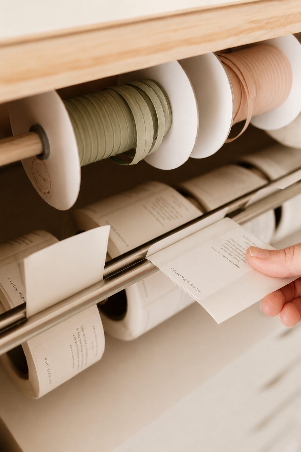 A small business workspace — ribbon spools and labels, the kind of place we build sites for.
